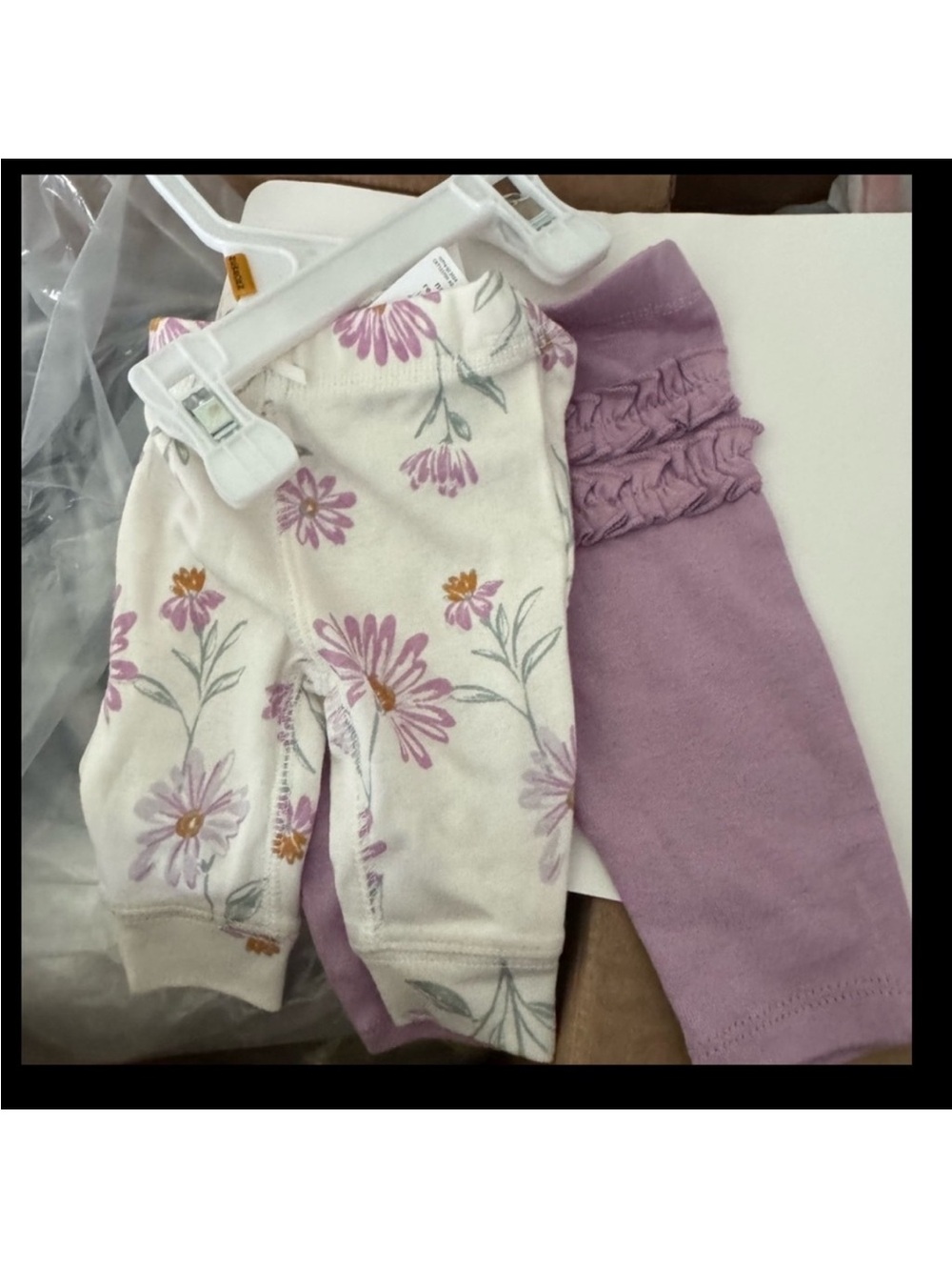 2- pairs Carter’s Newborn pants